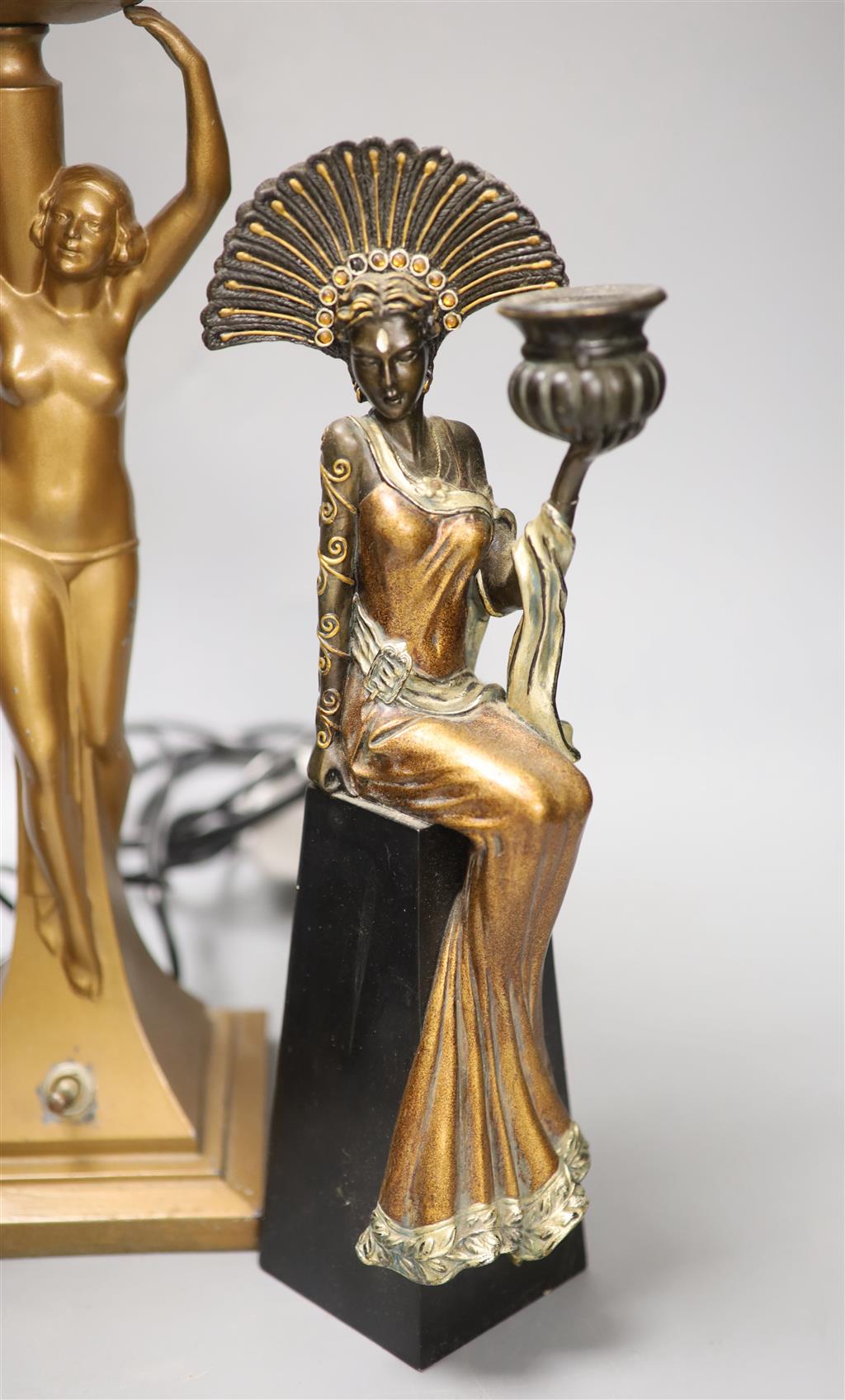 An Art Deco style figural lamp and two resin figural candlesticks, tallest 50cm